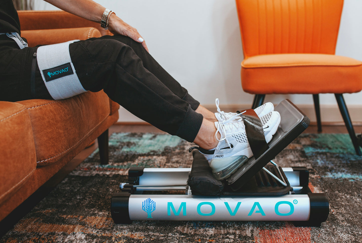 MOVAO Mini side angle with low resistance for use while sitting. Also pictured is the resistance band to hold thighs together while working out. Great for knee replacement surgery, stroke recovery and more